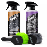 Salt Shift Rust Shield and All Purpose Cleaner bottles with detailing brushes, perfect for vehicle maintenance and deep cleaning.