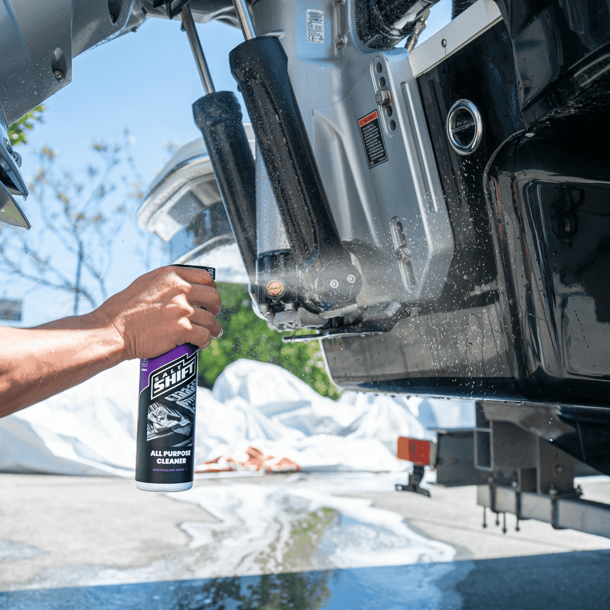 Salt Shift all purpose cleaner being sprayed on a boat
