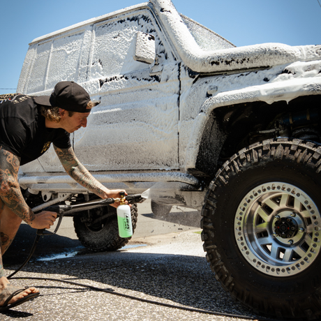 men washing truck