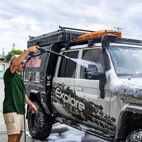 Men cleaning car with Salt Shit Quick Release Nozzle Kit